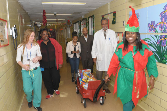UFT and hospital staff, including Burton-Myrick (in elf suit) and Dr. Hutchinson