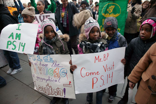 Students spell out their message for the borough president and the Department of