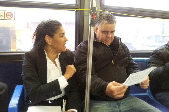 “Children Above Politics” day of action - Manhattan - Mayra Cruz UFT District 6 Representative Mayra Cruz distributes leaflets on the #7 bus.