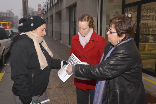 “Children Above Politics” Day of Action - PS 293 Queens - 1 PS 239 parent Gloria Hernandez receives a flier from the school’s chapter leader, Jeanne Gausman, and UFT District 24 Representative Rosemary Parker. (Miller Photography)