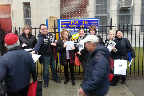 UFTers hand leaflets to passers-by outside PS 48, Brooklyn. UFTers hand leaflets to passers-by outside PS 48, Brooklyn.