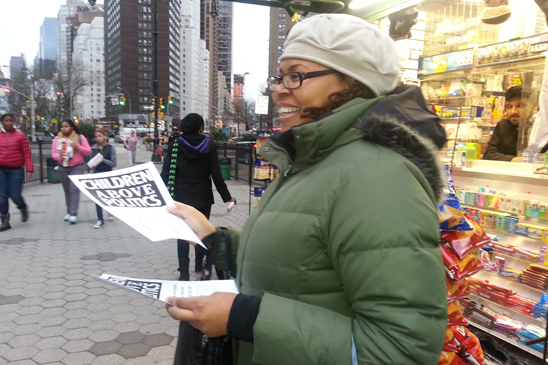 “Children Above Politics” day of action - Brooklyn Veronica Lawyer hands out leaflets in Brooklyn. (Miller Photography)
