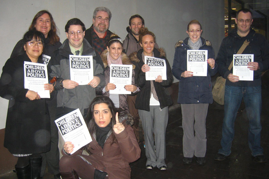 “Children Above Politics” Day of Action - IS 125 Queens - 2 Members from IS 125 in Queens get ready to distribute leaflets.