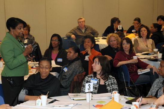 Shirley Hall of the Danielson Group addresses the participants. 