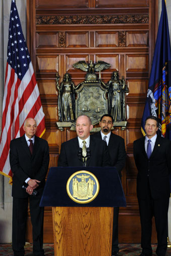 UFT President Michael Mulgrew discusses the agreement in Albany, with (from left