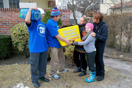 Chapter Leader Craig Dorsi and UFT Emma Mendez deliver supplies and support to fellow teacher Nataly Tarnarider — with Mike Mendez at Far Rockway, Queens. Chapter Leader Craig Dorsi and UFT Emma Mendez deliver supplies and support to fellow teacher Nataly Tarnarider — with Mike Mendez at Far Rockway, Queens.