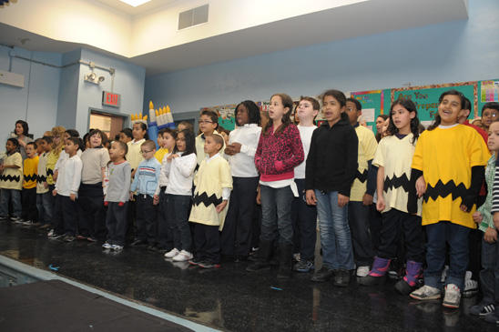 The children, singing “We Wish You A Merry Christmas,” practiced for two months and aced concerts in the community and at school. The children, singing “We Wish You A Merry Christmas,” practiced for two months and aced concerts in the community and at school. (Miller photography)