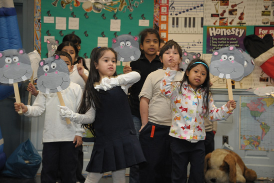 Requesting an unusual gift, kids sing “I Want A Hippopotamus For Christ (Miller photography)