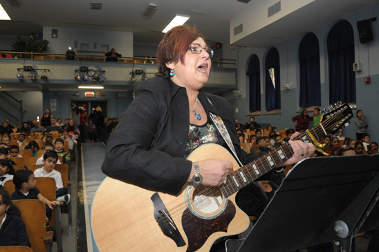 Marks, who teaches literacy through music, has been running the annual holiday show for eight years. Marks, who teaches literacy through music, has been running the annual holiday show for eight years. (Miller photography)