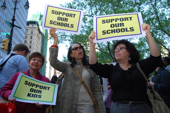 “The DOE website says ‘Children First;’ well, we’ve been devoting our lives to children, while the mayor has been devoting his life to making money,” said Laura Daigen-Ayala, at the rally with her colleagues from PS 48 in Manhattan. “The DOE website says ‘Children First;’ well, we’ve been devoting our lives to children, while the mayor has been devoting his life to making money,” said Laura Daigen-Ayala (at right), at the rally with her colleagues from PS 48 in Manhattan. (Cara Metz)