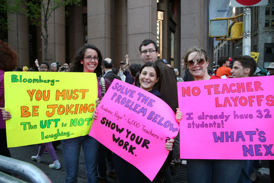 UFTers from PS 91 in Queens use “sign” language to deliver their message. UFTers from PS 91 in Queens use “sign” language to deliver their message. (Pat Arnow)