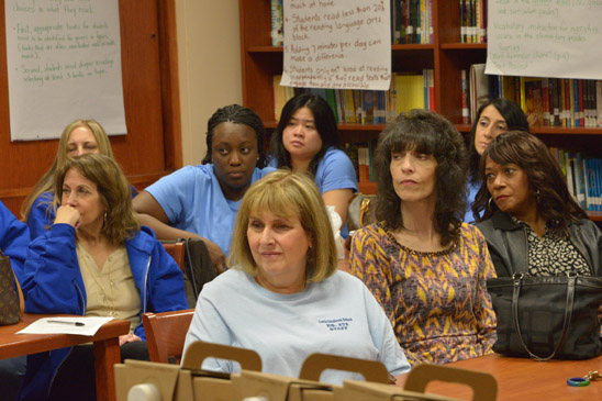Educators listen to the news from around the union, city and nation. (Miller Photography)