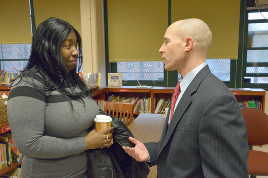UFT District 18 Representative Rich Mantell speaks with teacher Aneesah Stewart. (Miller Photography)