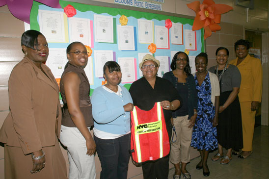 Eaddy (fourth from right) with the school response team (from left) Brenda Cumbe