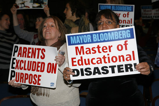 UFT Vice President Carmen Alvarez (right) was among the hundreds of protestors at the PEP. (Miller Photography)