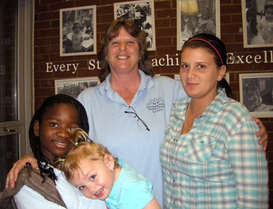 Education is all in the family for Patricia Lockhart (center), science teacher a
