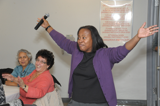 Guidance counselor Ronelle Garden from PS 30 in Jamaica sings a union song (Miller Photography)