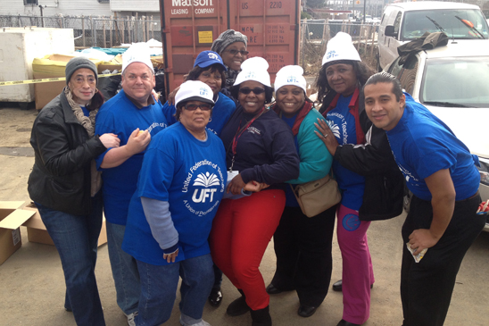 VP Janella Hinds, Chapter Chair Shelvy Young Abrams and Para Exec Board members helping at HS for Public Service.