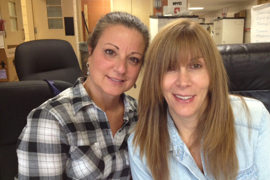 Lori Bracco of THS and Dolores Demario of PS 42 at Tottenville HS Dolores Demario of PS 42 and Lori Bracco of Tottenville HS volunteer at Tottenville HS, which gave shelter to hurricane evacuees.