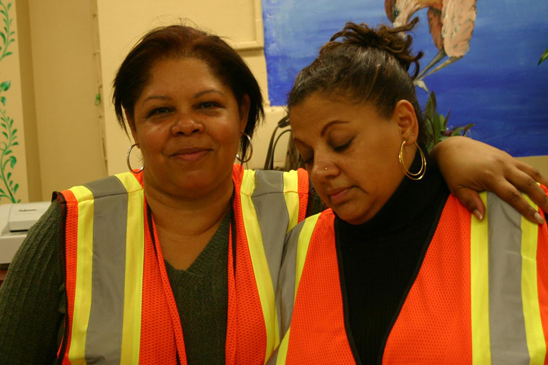 Joanna Beltran comforts Eleanor Jacobs at the Hungerford School, Staten Island Teachers assistant Joanna Beltran of PS 42, the Bronx, comforts Eleanor Jacobs, para at the Hungerford School, Staten Island, as she discusses the heartbreak she has witnessed working at the shelter at Susan Wagner HS.
