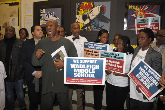 Veteran Wadleigh librarian Paul McIntosh, known to his students as “Mr. Mac,” revs up the crowd at a press conference before the hearing. Veteran Wadleigh librarian Paul McIntosh, known to his students as “Mr. Mac,” revs up the crowd at a press conference before the hearing. (Miller Photography)