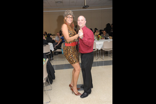 Gloria Oquendo, a paraprofessional representative at PS 463, and District Representative Steve Goldberg strut their stuff. (Miller Photography)