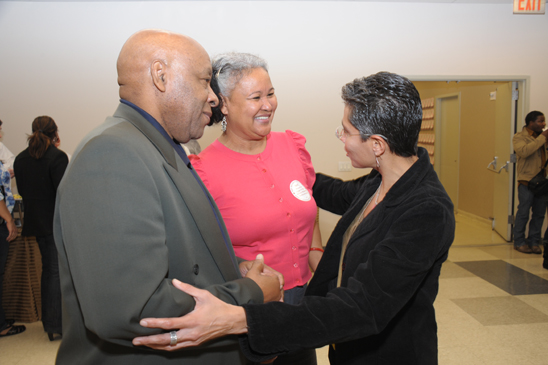 Guidance Counselor Chapter Chair Rosemarie Thompson (right) greets Wilfred Joseph, a guidance counselor at International School for Liberal Arts, and Maria Joseph, a guidance counselor at Discovery HS. (Miller Photography)