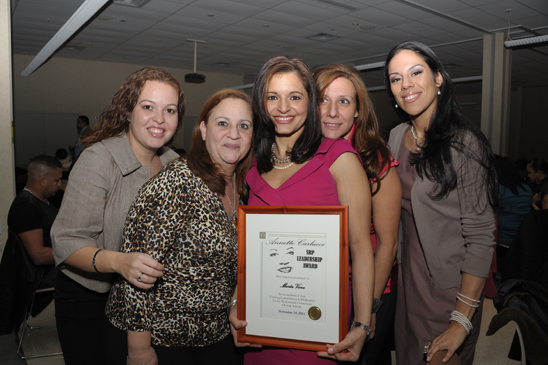 It’s a great day for PS/MS 218 staffers (from left) Iraida Gonzalez, business manager; Marta Viera, an award-winning secretary; Elba Rodriguez, the chapter leader; Noni Catechis, the payroll secretary; and Tabby Vargas, pupil accounting. (Miller Photography)