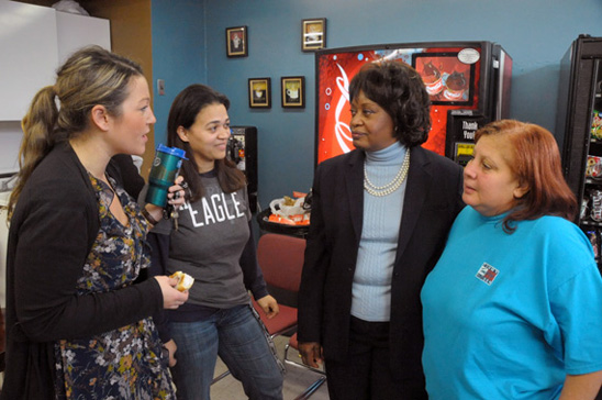 Teacher Kiersten Ward, Paraprofessional Miguelina Nunez, UFT Paraprofessional Chapter Leader Shelvy Young-Abrams and Paraprofessional Lirio Vasquez discussing the day ahead.