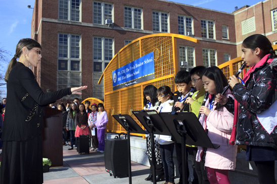 PS 173, Queens: With their banner of excellence on display, PS 173 students add their musical talents to the celebration under the direction of music teacher Lanie Kaish. PS 173, Queens: With their banner of excellence on display, PS 173 students add their musical talents to the celebration under the direction of music teacher Lanie Kaish. (Dave Sanders)
