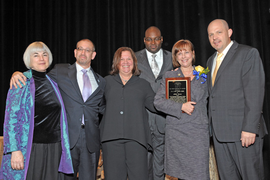 Audrey Chasen Award Audrey Chasen Award
Honoree Lila Ezra (with plaque), the director of the UFT Member Assistance Program, and (from left) UFT Health and Safety Director Chris Proctor, School Safety Director David Kazansky, Engler, UFT Vice President Sterling Roberson and Mulgrew. (Miller Photography)