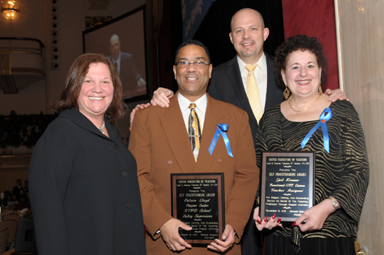 Eli Trachtenberg Awards for high school chapter leaders Eli Trachtenberg Awards functional chapters: Winning chapter leaders are NYPD School Safety Supervisor Calvin Lloyd and Gail Kramer, teachers assigned, with Engler and Mulgrew. (Miller Photography)