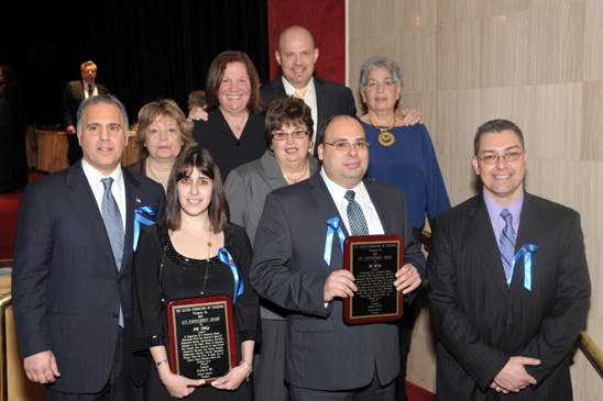 Partnership Award - Queens Partnership Award - Queens: Winners are (front row, from left) PS 78 Principal Louis Pavone and Chapter Leader Victoria Mulligan, and PS 61 Chapter Leader Joseph Natale and Principal Joseph Lisa, with (second row, from left) District 30 Representative Barbara Mylite and District 24 Representative Rosemary Parker, and (top row, from left) Engler, Mulgrew and Queens Borough Representative Rona Freiser. (Miller Photography)