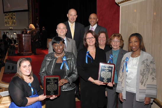 Partnership Award - Bronx Partnership Award - Bronx: Award-winners are (front row, from left) CS 300 Chapter Leader Kerri Ann Martin and Principal Venessa Singleton, and PS/MS 83 Principal Claudia Macek and Chapter Leader Alison Chilson with District 11 Representative Alice Cooper-Jackson (right) and (middle row) District 12 Representative Steven Goldberg and Engler, and (top row) Mulgrew and Bronx Borough Representative Jose Vargas. (Miller Photography)