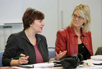 Blower (left) makes a point, while Mary Lou Donnelly of the Canadian Teachers Fe