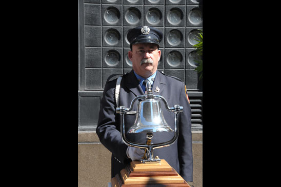 Firefighter James Sorokac said of the bell that would toll in honor of the dead, “this is the same bell we use to honor those who lost their lives at Ground Zero.” Firefighter James Sorokac said of the bell that would toll in honor of the dead, “this is the same bell we use to honor those who lost their lives at Ground Zero.” (Miller Photography)