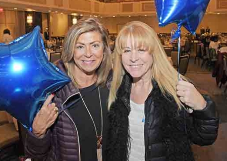 Joan Franzese (left) and Hadassah Rosenman show off the balloons they received a