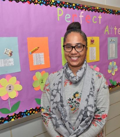Elaine Taylor, a paraprofessional for 16 years, is now an attendance teacher,