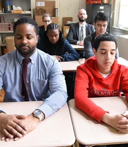 Students and educators meditate together twice daily at the Bronx HS for Law and