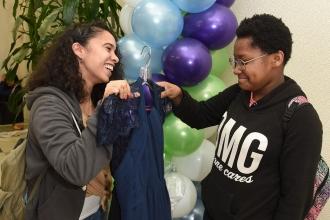 Katelyn Maldonado (left), a teacher at IS 217 in the Bronx, is impressed by her 