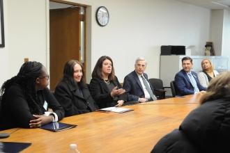 UFT VP Mary Vaccaro talks with UFT members and an assemblyman in Albany