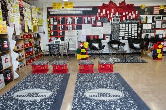 Classroom with two composition book rugs