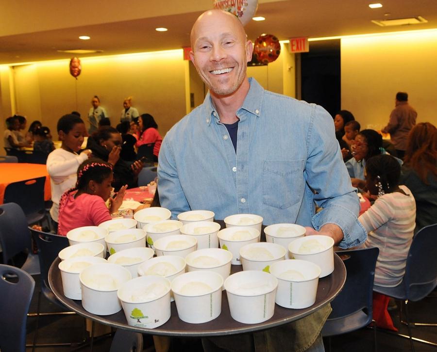UFT Vice President for Middle Schools Richard Mantell serves ice cream for make-