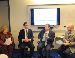 UFT Jewish Heritage Committee Chair David Kazansky (right) leads the discussion.