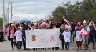 Chapter Leader Millie Colon (in pink pirate hat, center) leads walkers from PS 1