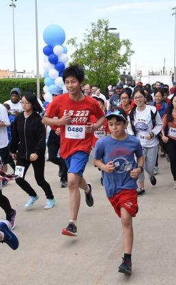 Runners young and old take off at the start of the event at MCU Park in Brooklyn