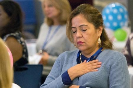 Participants experience a “mindfulness minute” during the opening session.