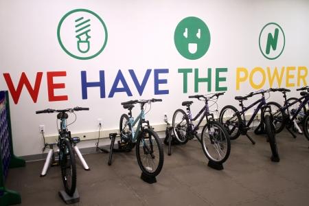 When students pedal the stationary bicycles in the building and on the playground, the me-chanical energy they generate is converted to electricity for the school.