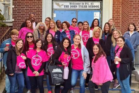 Staffers at PS 45 on Staten Island wear pink in memory of Denise Budde, a prekindergarten teacher and chapter leader who died of breast cancer in 2019. 