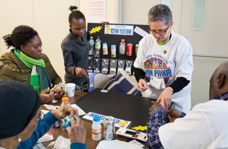 Queens parents check in at their conference.